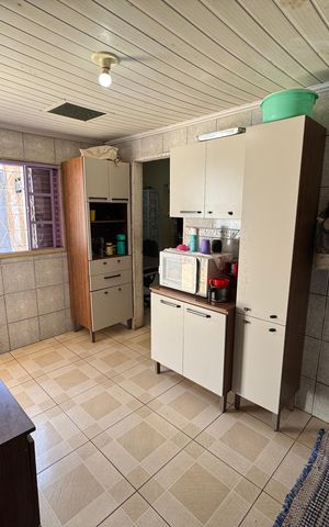 Casa à venda com 150m², 2 quartos e 2 vagas Casa à venda com 150m², 2 quartos e 2 vagasCozinha