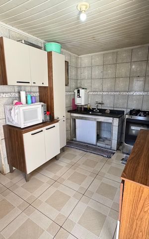 Casa à venda com 150m², 2 quartos e 2 vagas Casa à venda com 150m², 2 quartos e 2 vagasCozinha