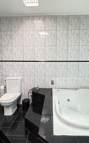 Casa para alugar com 356m², 3 quartos e 4 vagasBanheiro da Suíte