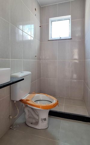 Casa à venda com 70m², 2 quartos e 1 vaga Casa à venda com 70m², 2 quartos e 1 vagaBanheiro social