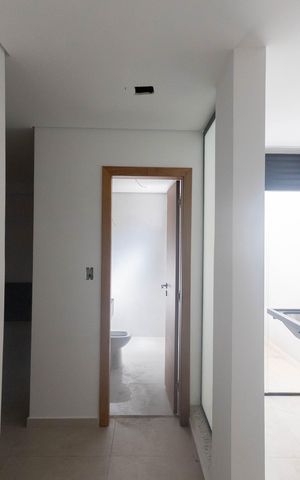 Apartamento à venda com 54m², 2 quartos e 1 vaga Apartamento à venda com 54m², 2 quartos e 1 vagaCozinha e Área de Serviço
