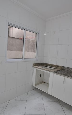 Casa de condomínio para alugar com 70m², 2 quartos e 2 vagasCozinha