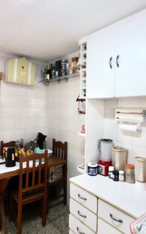 Casa à venda com 71m², 2 quartos e 2 vagas Casa à venda com 71m², 2 quartos e 2 vagasCozinha