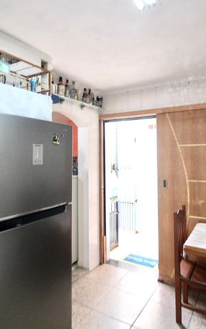 Casa à venda com 71m², 2 quartos e 2 vagas Casa à venda com 71m², 2 quartos e 2 vagasCozinha