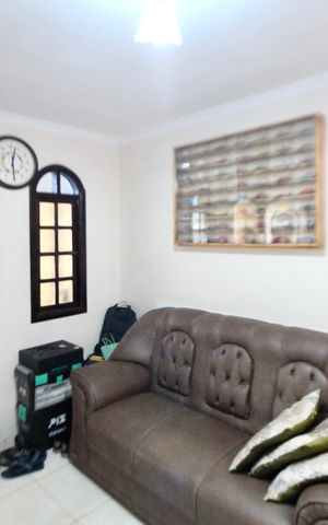 Casa à venda com 71m², 2 quartos e 2 vagas Casa à venda com 71m², 2 quartos e 2 vagasSala