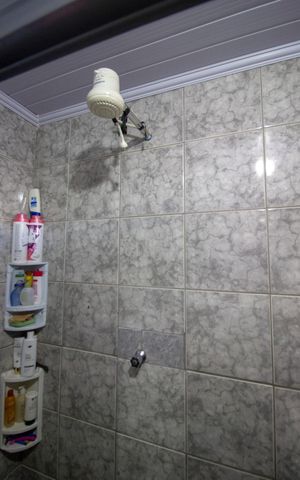 Casa à venda com 250m², 5 quartos e 3 vagasBanheiro da suíte