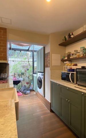 Casa à venda com 98m², 3 quartos e 2 vagas Casa à venda com 98m², 3 quartos e 2 vagasCozinha