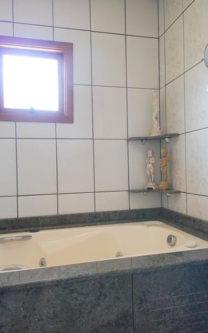 Casa à venda com 300m², 5 quartos e 2 vagasBanheiro da Suíte