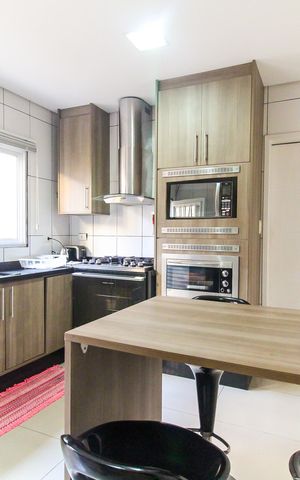 Casa à venda com 140m², 3 quartos e 2 vagas Casa à venda com 140m², 3 quartos e 2 vagasCozinha