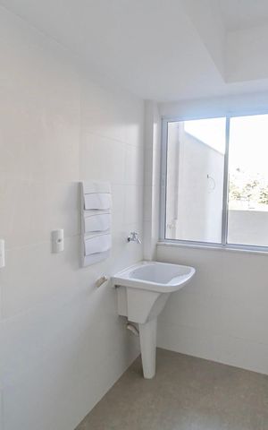 Apartamento à venda com 77m², 2 quartos e 2 vagas Apartamento à venda com 77m², 2 quartos e 2 vagasCozinha e Área de Serviço
