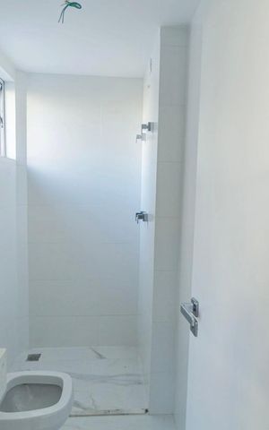 Apartamento à venda com 77m², 2 quartos e 2 vagas Apartamento à venda com 77m², 2 quartos e 2 vagasSuíte 1 - Banheiro