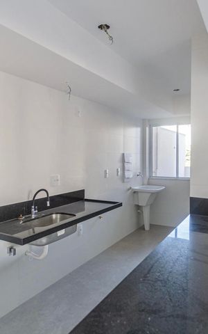 Apartamento à venda com 77m², 2 quartos e 2 vagas Apartamento à venda com 77m², 2 quartos e 2 vagasCozinha e Área de Serviço