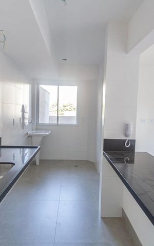 Apartamento à venda com 77m², 2 quartos e 2 vagas Apartamento à venda com 77m², 2 quartos e 2 vagasCozinha e Área de Serviço