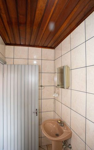Casa à venda com 260m², 5 quartos e 3 vagasBanheiro da Suíte 2