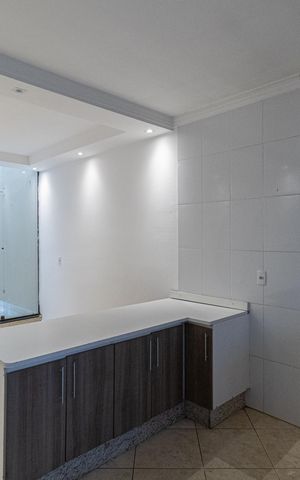 Casa à venda com 147m², 3 quartos e 3 vagas Casa à venda com 147m², 3 quartos e 3 vagasCozinha