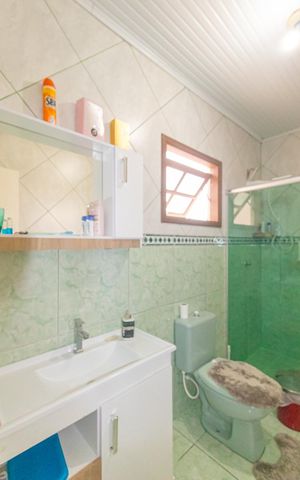 Casa à venda com 126m², 3 quartos e 2 vagasBanheiro da Suíte