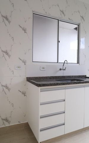 Casa de condomínio para alugar com 90m², 2 quartos e 2 vagasCozinha