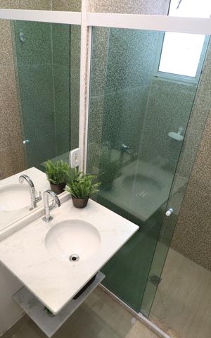 Casa de condomínio para alugar com 90m², 2 quartos e 2 vagasBanheiro do Quarto 1