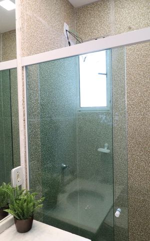 Casa de condomínio para alugar com 90m², 2 quartos e 2 vagasBanheiro do Quarto 1