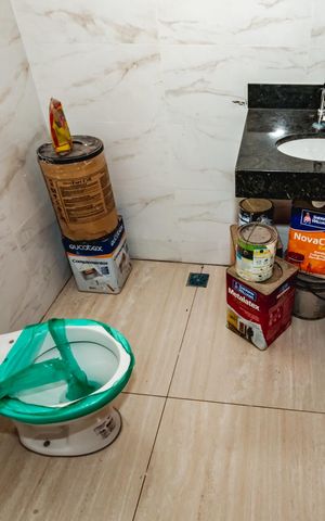 Casa à venda com 87m², 2 quartos e 2 vagasBanheiro da Suíte 1