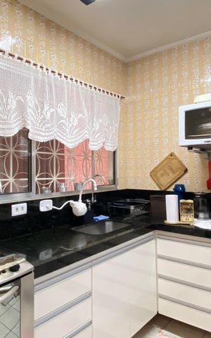 Casa à venda com 250m², 4 quartos e 10 vagas Casa à venda com 250m², 4 quartos e 10 vagasCozinha
