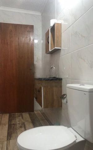 Casa à venda com 97m², 3 quartos e 2 vagas