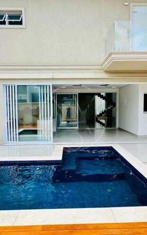 Casa de condomínio para alugar com 308m², 4 quartos e 4 vagas