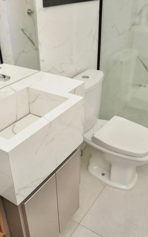 Apartamento à venda com 58m², 2 quartos e 1 vaga Apartamento à venda com 58m², 2 quartos e 1 vagaBanheiro da Suíte