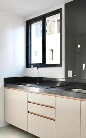 Apartamento à venda com 58m², 2 quartos e 1 vaga Apartamento à venda com 58m², 2 quartos e 1 vagaCozinha e Área de Serviço