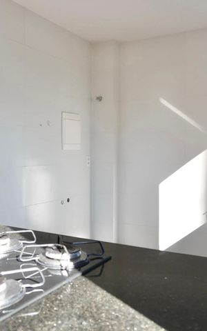 Apartamento à venda com 58m², 2 quartos e 1 vaga Apartamento à venda com 58m², 2 quartos e 1 vagaCozinha e Área de Serviço