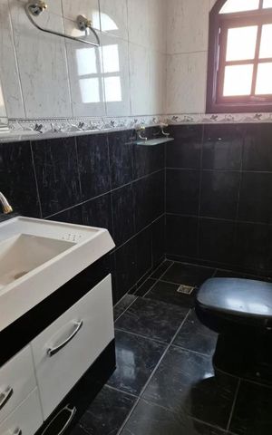 Casa à venda com 200m², 4 quartos e 2 vagasBanheiro