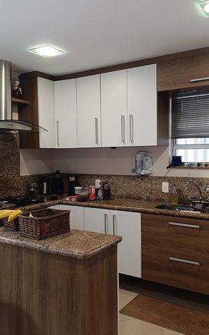 Casa à venda com 150m², 3 quartos e 2 vagas Casa à venda com 150m², 3 quartos e 2 vagasCozinha