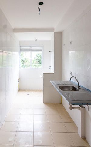 Apartamento à venda com 65m², 2 quartos e 2 vagasCozinha e Área de serviço