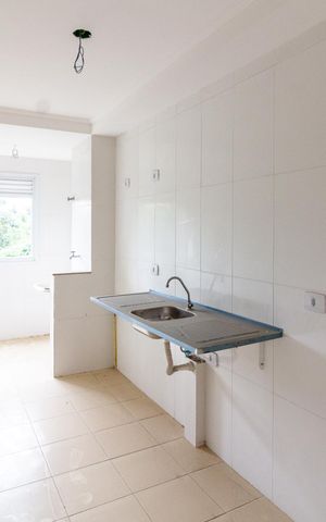 Apartamento à venda com 65m², 2 quartos e 2 vagasCozinha e Área de serviço