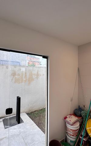 Casa de condomínio à venda com 100m², 3 quartos e 2 vagas Casa de condomínio à venda com 100m², 3 quartos e 2 vagasCozinha e Área de Serviço