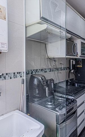 Apartamento à venda com 57m², 2 quartos e 1 vaga Apartamento à venda com 57m², 2 quartos e 1 vagacozinha e área de serviço compartilhadas_3