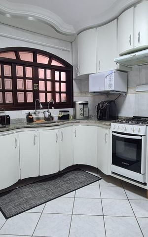 Casa à venda com 171m², 3 quartos e 2 vagas Casa à venda com 171m², 3 quartos e 2 vagasCozinha