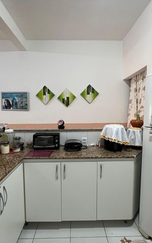 Casa à venda com 216m², 2 quartos e 2 vagas Casa à venda com 216m², 2 quartos e 2 vagasCozinha
