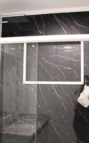 Casa à venda com 390m², 4 quartos e 2 vagasBanheiro da Suíte 3