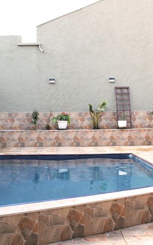 Casa à venda com 390m², 4 quartos e 2 vagasPiscina
