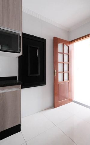 Casa de condomínio à venda com 83m², 2 quartos e 1 vagaCozinha e Área de Serviço
