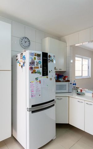 Casa à venda com 124m², 3 quartos e 2 vagas Casa à venda com 124m², 3 quartos e 2 vagasCozinha