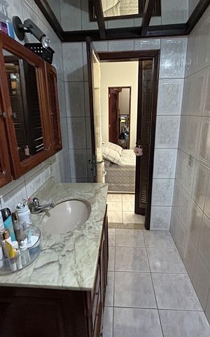 Casa à venda com 289m², 4 quartos e 2 vagasBanheiro do Quarto 3 suíte
