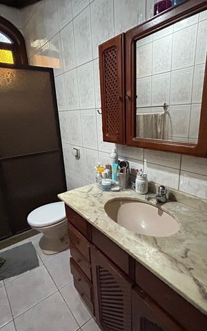 Casa à venda com 289m², 4 quartos e 2 vagasBanheiro do Quarto 3 suíte