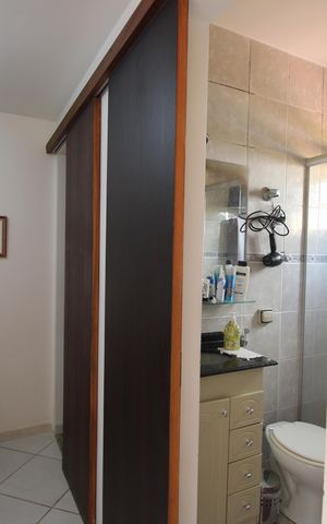 Casa de condomínio à venda com 130m², 3 quartos e 1 vagaBanheiro da suíte 2