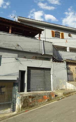 Casa à venda com 388m², 4 quartos e 2 vagasVista Lateral ( casas 2, 3 e 4 + salão) 