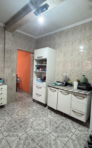 Casa à venda com 186m², 3 quartos e 2 vagas Casa à venda com 186m², 3 quartos e 2 vagasCozinha
