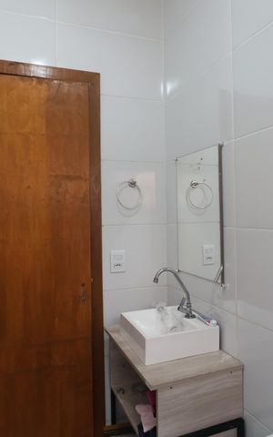 Casa para alugar com 67m², 3 quartos e 2 vagasBanheiro da Suíte