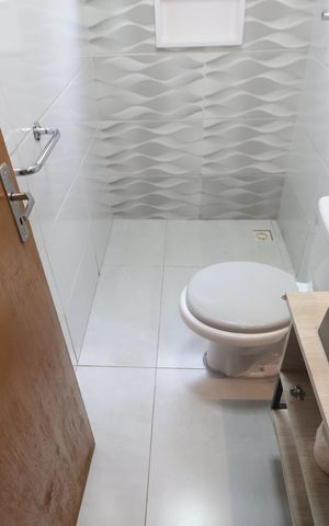 Casa para alugar com 67m², 3 quartos e 2 vagasBanheiro