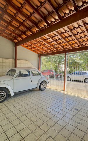 Casa à venda com 113m², 4 quartos e 2 vagas Casa à venda com 113m², 4 quartos e 2 vagasGaragem